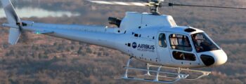 emplacement de jet privé : H130 survole un canyon.